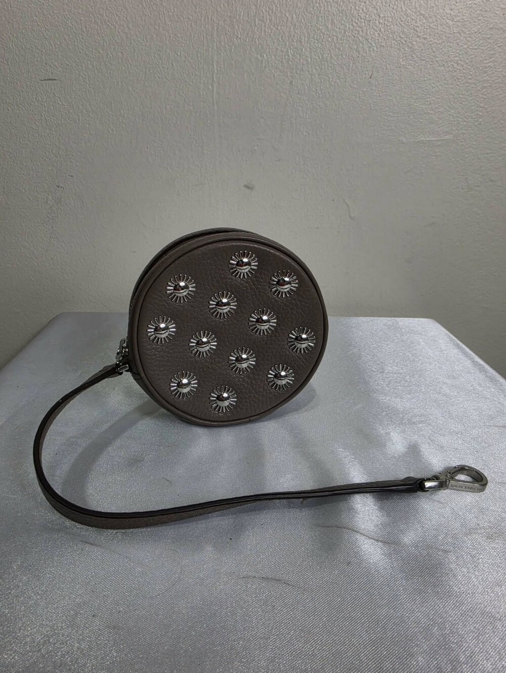 Michael Kors Round Brown Leather Wristlet with Silver Stud Accents